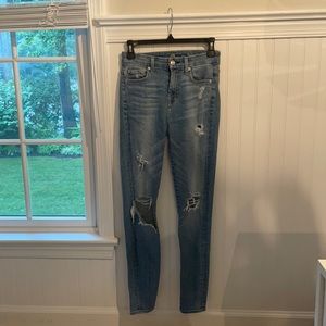 High Rise Medium Wash Ripped Skinny Jeans